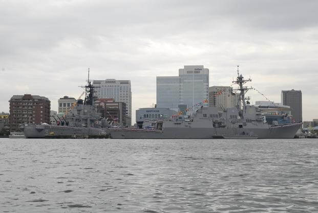 Guided-missile destroyer USS Nitze, right, is moored in downtown Norfolk celebrating Fleet Week Hampton Roads 2009. Nitze is next to the battleship USS Wisconsin which serves as a museum at the Nauticus. (Photo by Petty Officer 2nd Class Santos Huante) Guided-missile destroyer USS Nitze, right, is moored in downtown Norfolk celebrating Fleet Week Hampton Roads 2009.